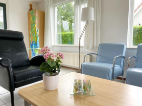 Отель Modern en kleurrijk vakantiehuisje aan de Zeeuwse kust - Stern 263  Брескенс
